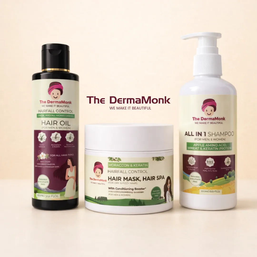 The DermaMonk hair care product set including hair oil, shampoo, and hair mask on a beige background.